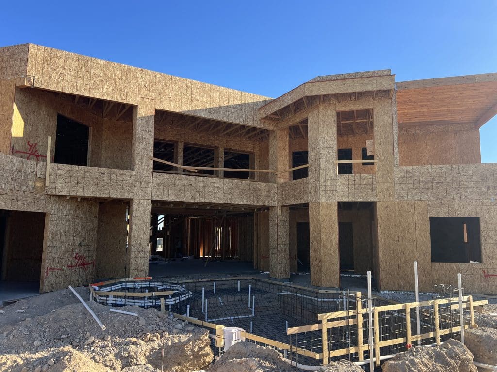 Newly constructed house framework visible