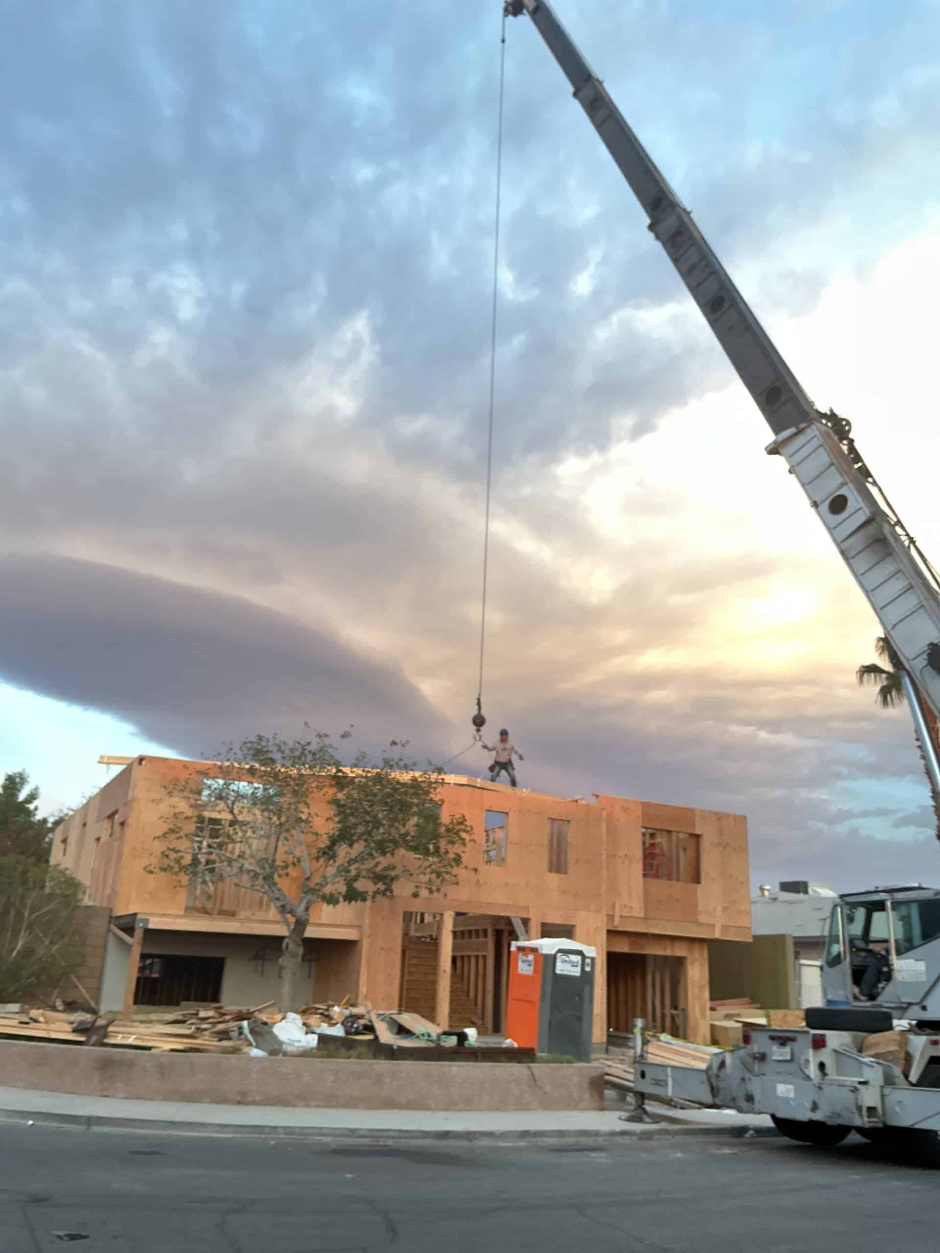 Construction site with crane and workers
