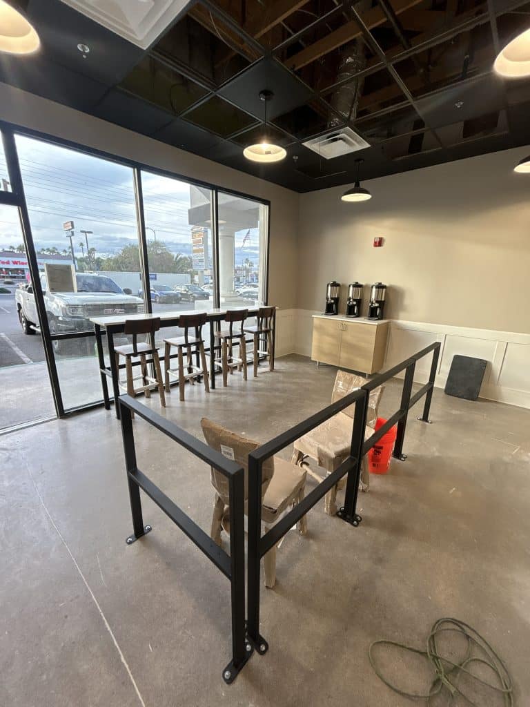 Empty cafe interior with furniture setup