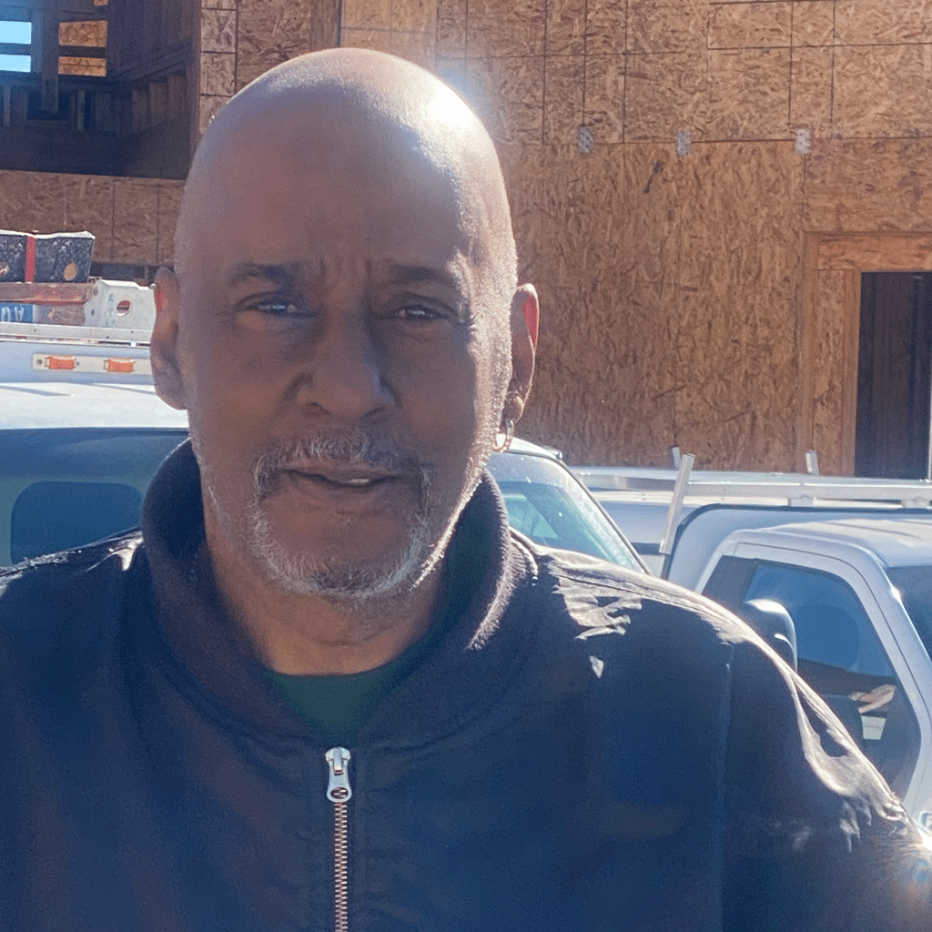 Person in front of construction site.