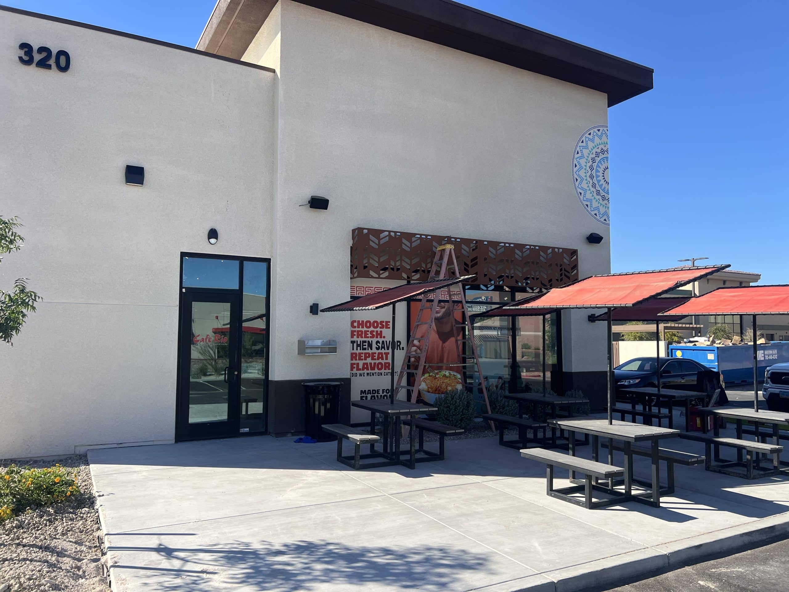 Restaurant exterior with outdoor seating.
