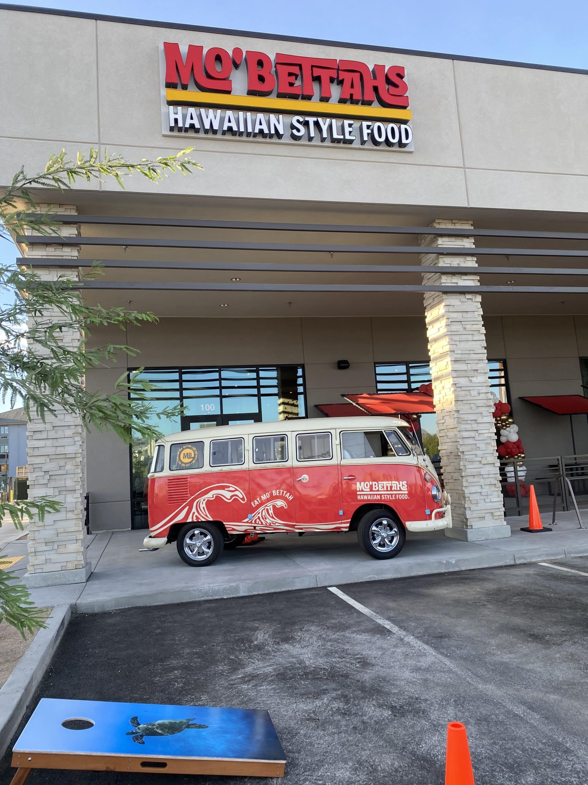 Food truck outside restaurant entrance