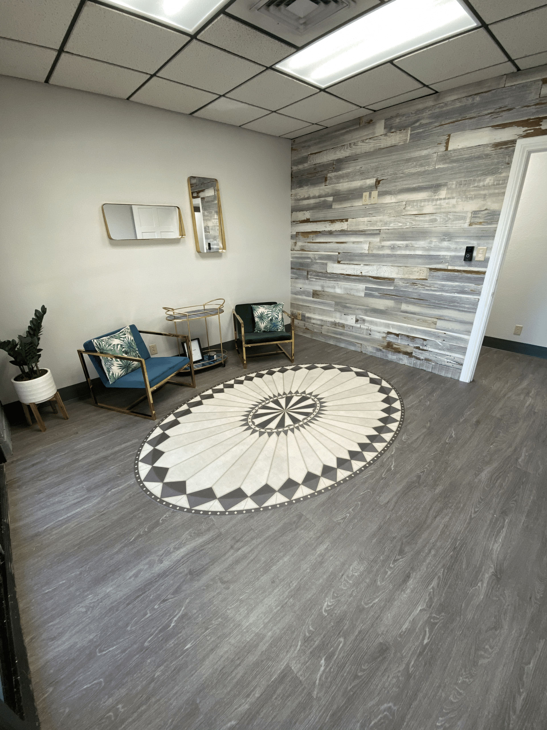 Modern waiting area with decorative rug